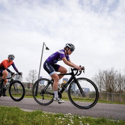 A UCL rider racing in club kit
