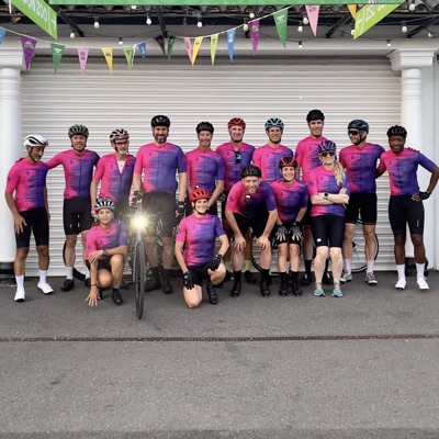 The Dawn Raid Velo club in the pink and purple tenth-year kit
